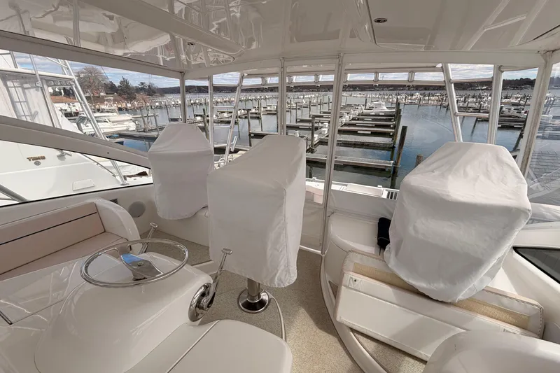 Slide: The Image of Interior view of a 2015 Viking 42 Open yacht at a marina. - 13