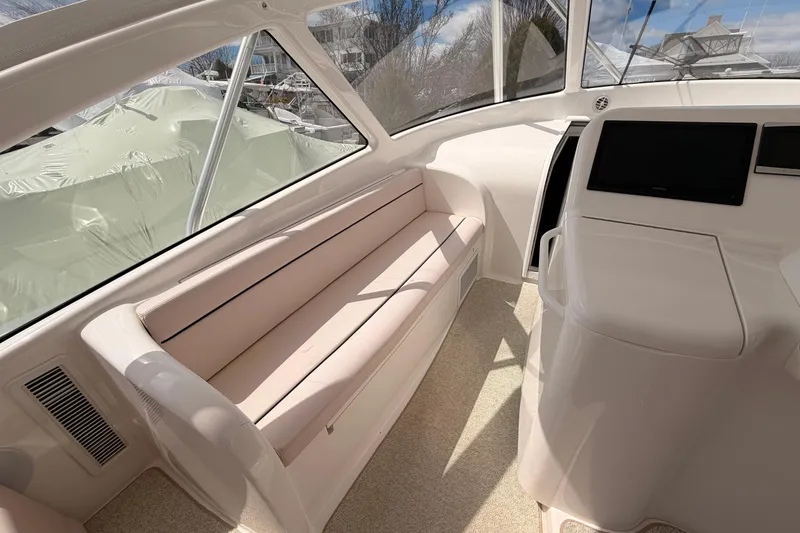Slide: The Image of Interior of 2015 Viking 42 Open yacht with seating and helm station. - 18