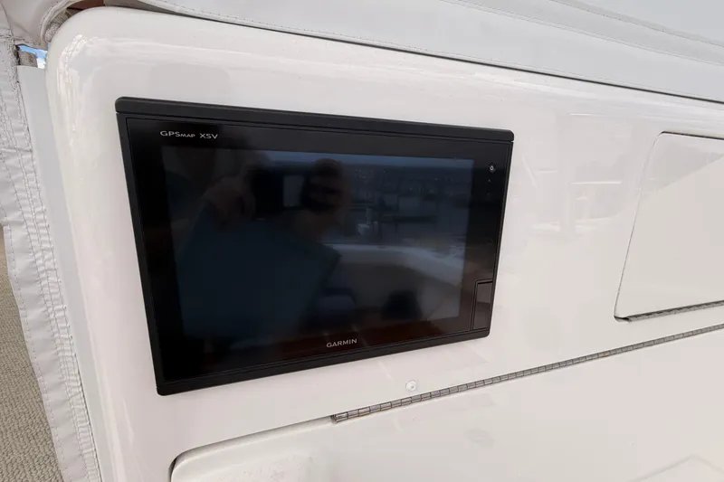 Slide: The Image of Garmin GPSMAP XSV on 2015 Viking 42 Open yacht dashboard. - 6