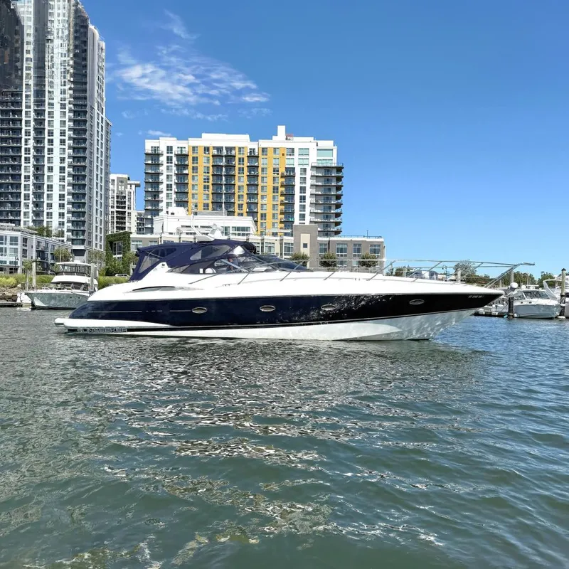 The Image of 2002 Sunseeker Camargue 44 yacht in urban marina setting. - 0