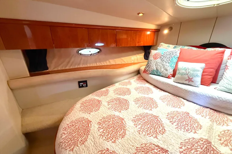 Slide: The Image of Luxurious cabin interior of 2002 Sunseeker Camargue 44 yacht with elegant bedding and cushions. - 14