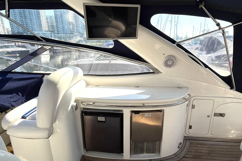 Slide: The Image of Interior of a 2002 Sunseeker Camargue 44 yacht with modern amenities. - 5
