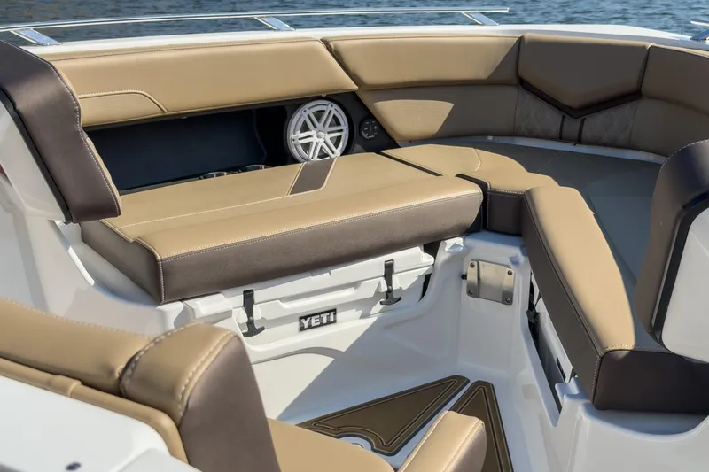 Slide: The Image of Luxurious seating area on the 2026 Monterey Elite 30 OB boat with Yeti cooler. - 14
