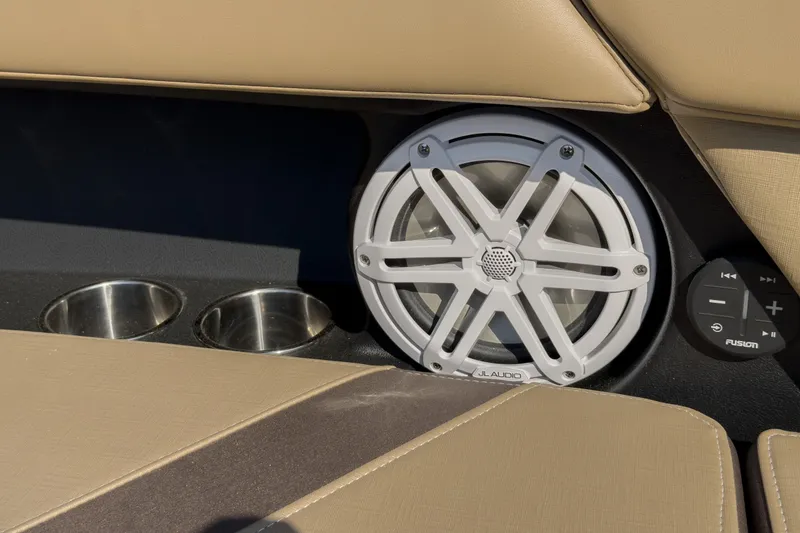 Slide: The Image of Speaker and controls on 2026 Monterey Elite 30 OB boat with cup holders. - 19