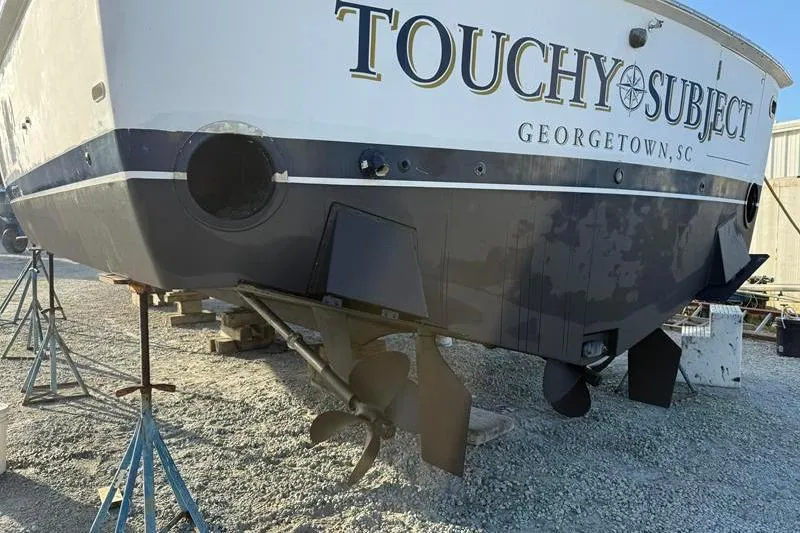 Slide: The Image of 1996 Bertram 50 Convertible boat named "Touchy Subject" in dry dock, Georgetown, SC. - 10