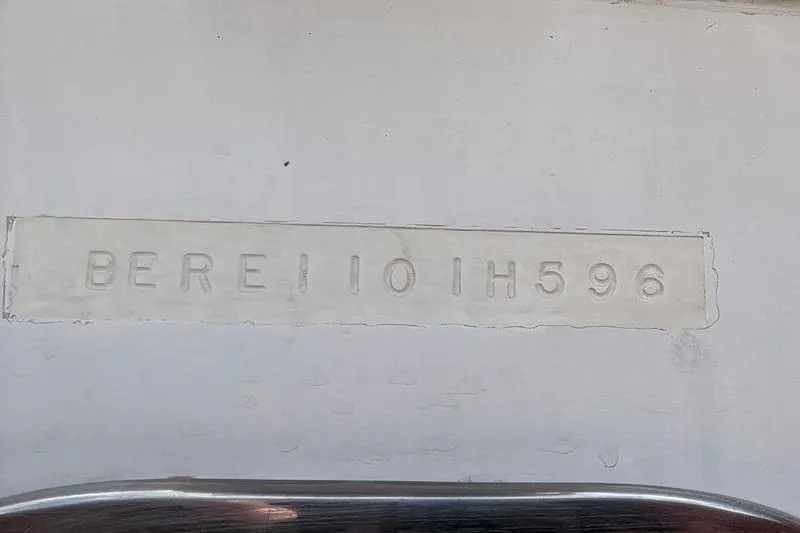 Slide: The Image of Hull identification number on a 1996 Bertram 50 Convertible boat. - 47