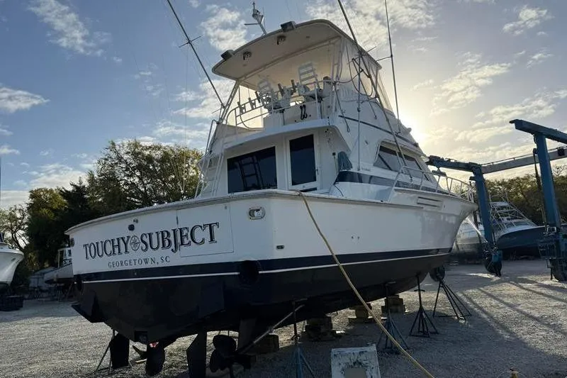Slide: The Image of 1996 Bertram 50 Convertible yacht on dry dock in Georgetown, SC. - 8