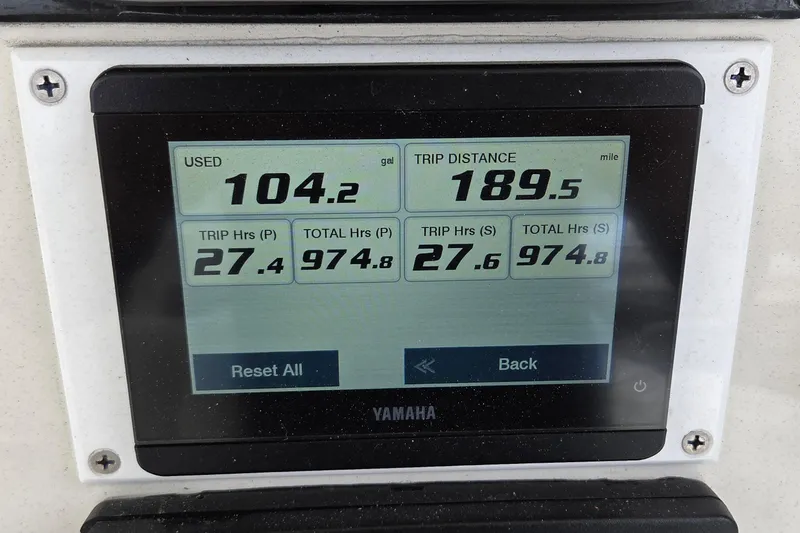 Slide: The Image of Yamaha display showing fuel usage and trip data on a 2016 Sailfish 320 CC boat. - 15