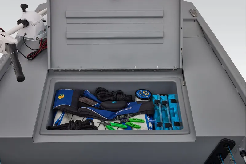 Slide: The Image of 2026 Tracker Bass Tracker Classic CC storage with fishing gear. - 21