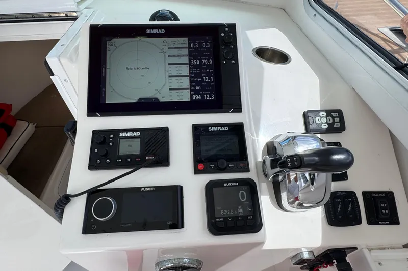 Slide: The Image of Control panel of a 2019 Steiger Craft 255 Miami boat with Simrad electronics. - 19