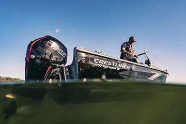 Slide: The Image of Manufacturer Provided Image: 2022 Crestliner 1750 Fish Hawk SE boat on water with person fishing. - 4