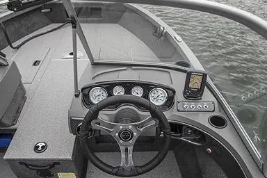 Slide: The Image of Manufacturer Provided Image: 2022 Crestliner 1750 Fish Hawk SE boat dashboard with steering wheel and navigation system. - 6
