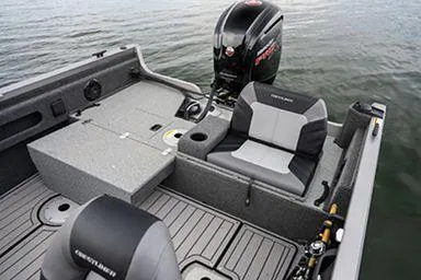 Slide: The Image of Manufacturer Provided Image: 2022 Crestliner 1750 Fish Hawk SE boat interior with seating and motor. - 9