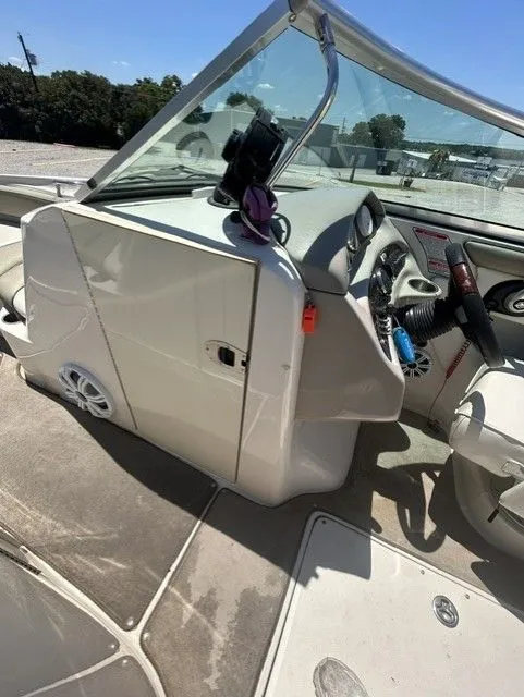 Slide: The Image of Interior view of a 2006 Sea Ray 240 Sundeck boat. - 12