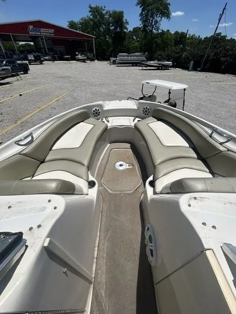 Slide: The Image of Interior view of a 2006 Sea Ray 240 Sundeck boat with seating area. - 15