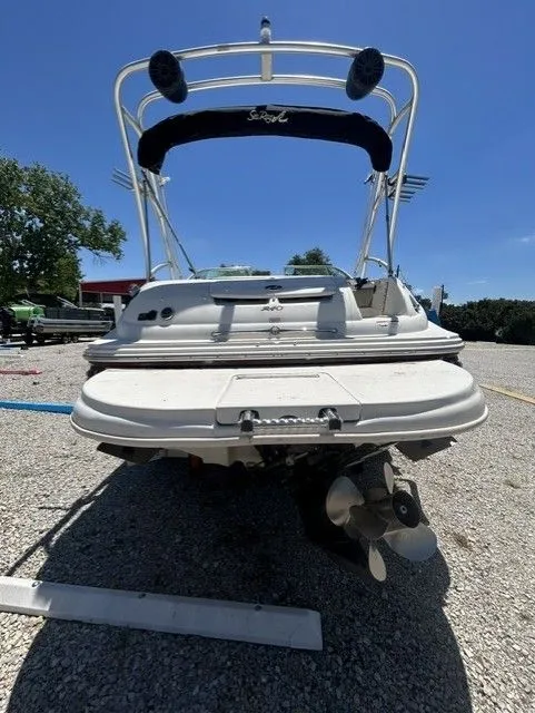 Slide: The Image of Rear view of a 2006 Sea Ray 240 Sundeck boat on gravel. - 8