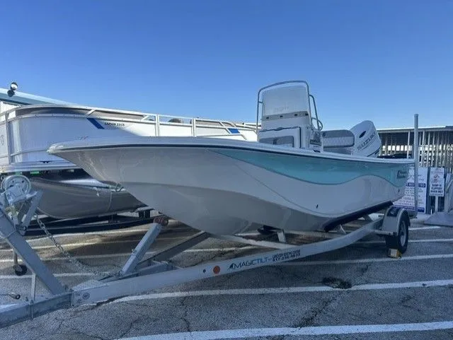 Slide: The Image of 2025 Carolina Skiff 21 LS boat with 150HP Suzuki and aluminum trailer. - 13