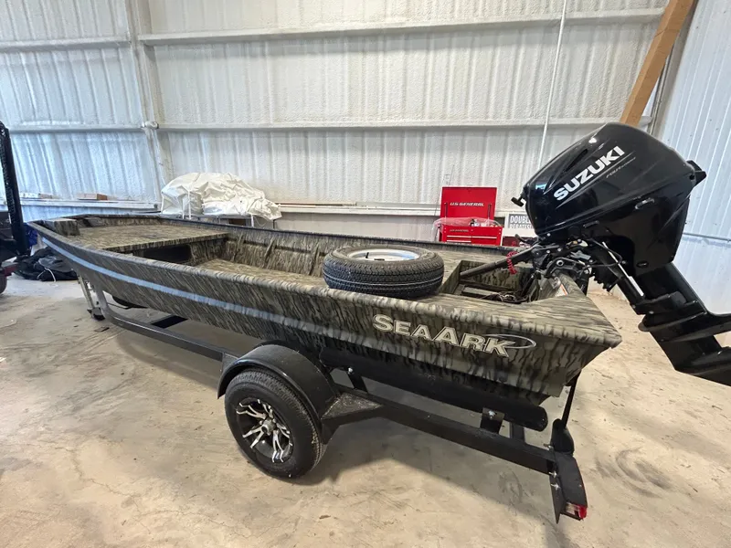 Slide: The Image of SeaArk 1648 Special with 25hp Suzuki and custom single axle trailer 2025 - 10