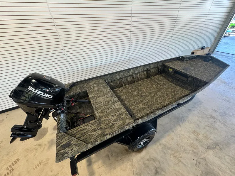 Slide: The Image of SeaArk 1648 Special with 25hp Suzuki and custom single axle trailer 2025 - 4