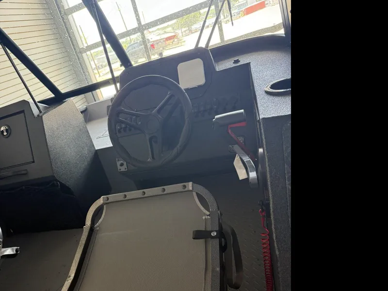 Slide: The Image of SeaArk Protege with 200HP Suzuki and Custom tandem axle trailer 2026 - 4