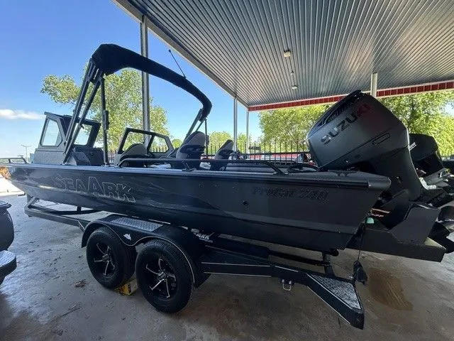 Slide: The Image of 2026 SeaArk PROCAT 240 boat with 250HP Suzuki and tandem axle trailer. - 13