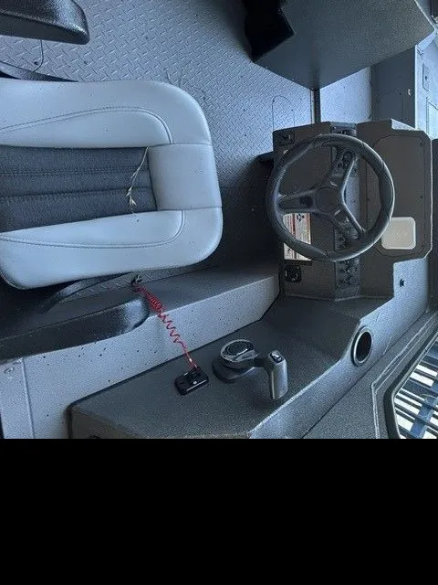Slide: The Image of Interior view of SeaArk PROCAT 240 boat, model year 2026. - 16