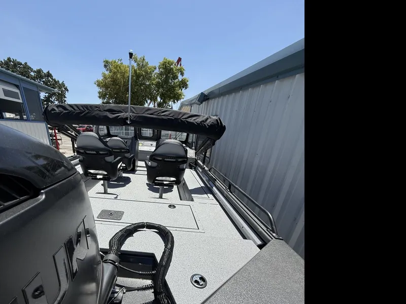 Slide: The Image of SeaArk SeaArk PROCAT 240 with 250HP Suzuki and custom trandem axle trailer 2026 - 5