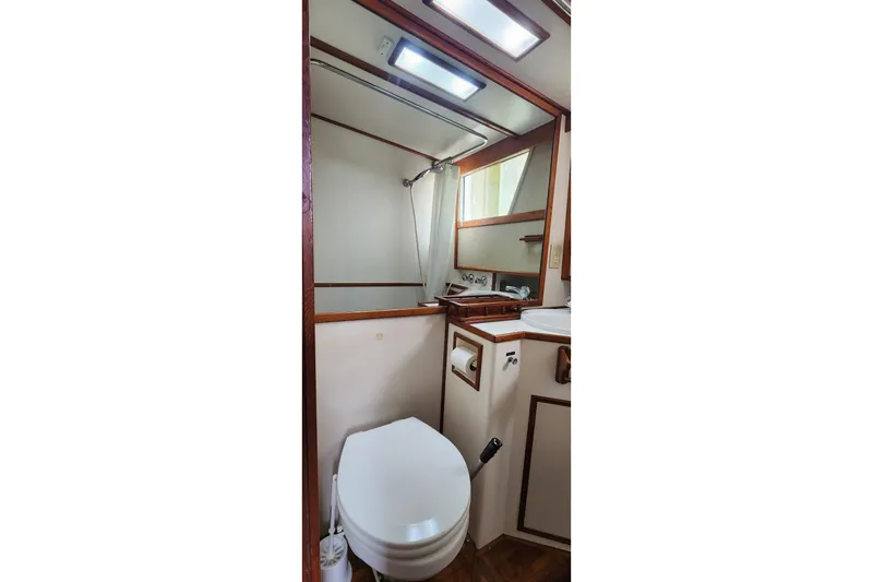 Slide: The Image of Bathroom interior of 1987 Grand Banks 36 Classic yacht, featuring toilet and sink. - 22