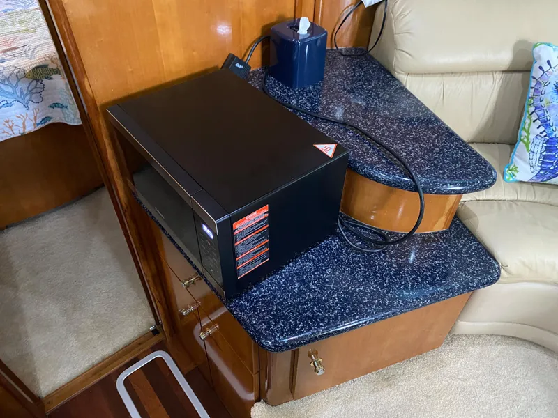 Slide: The Image of Microwave on granite countertop in 2000 Carver 396 Motor Yacht interior. - 35