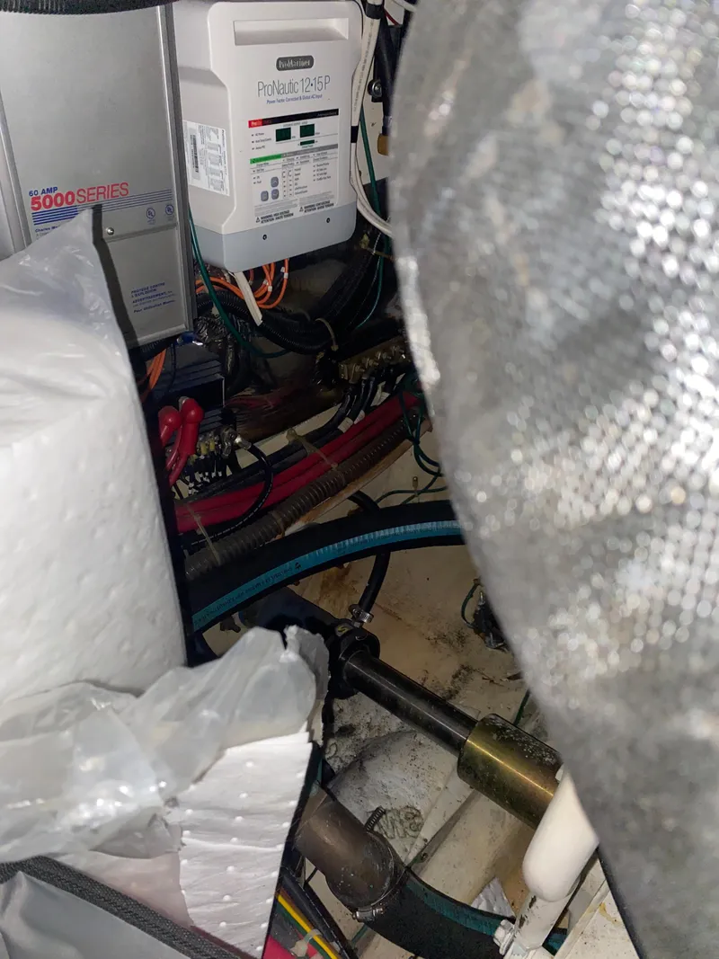 Slide: The Image of Engine room of a 2000 Carver 396 Motor Yacht with electrical components. - 43