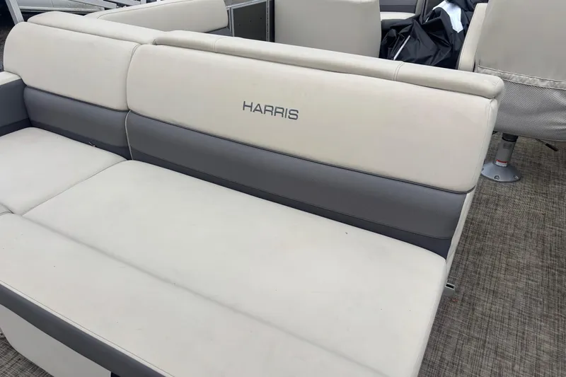 Slide: The Image of 2023 Harris Cruiser 190 boat seat with gray and beige upholstery. - 7
