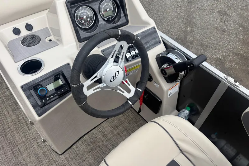 Slide: The Image of Interior view of 2023 Harris Cruiser 190 helm. - 8