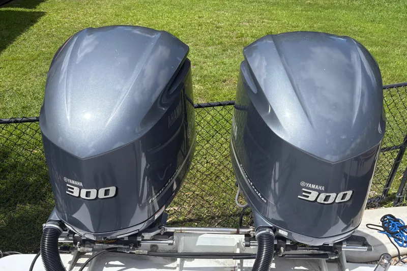 Slide: The Image of Twin Yamaha 300 outboard motors on a 2002 Ocean Runner 30 boat. - 27