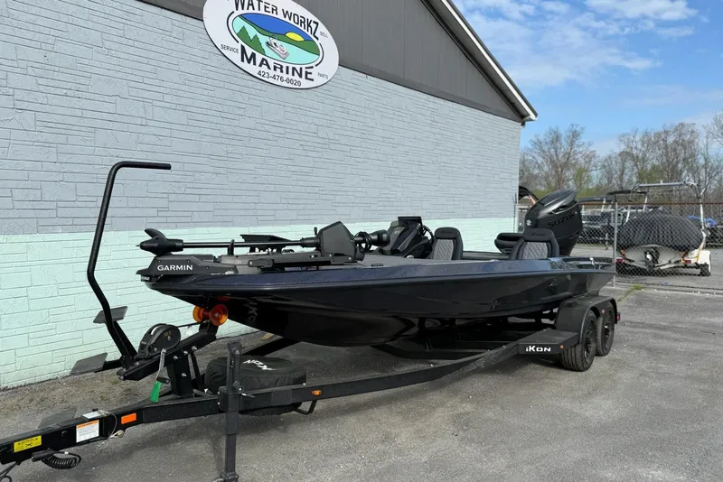Slide: The Image of 2026 iKon LXE20 boat on trailer at Water Workz Marine dealership. - 1