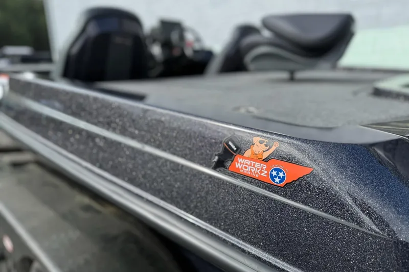 Slide: The Image of 2026 iKon LXE20 boat with Water Workz Marine sticker on sleek, metallic surface. - 3