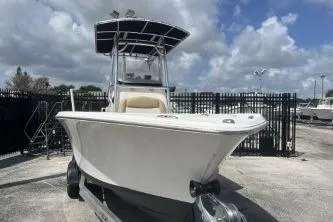 Slide: The Image of 2023 NauticStar 2302 Legacy boat on trailer, outdoor display. - 3