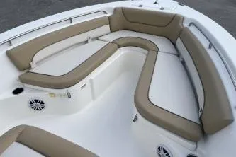 Slide: The Image of 2023 NauticStar 2302 Legacy boat with spacious seating and modern design. - 9