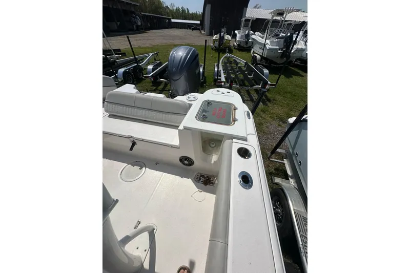 Slide: The Image of 2023 Sea Fox 228 Commander boat interior with seating and storage compartments. - 11