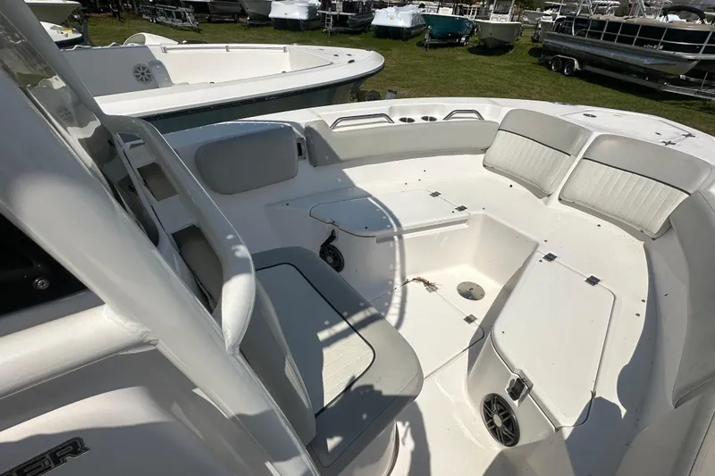 Slide: The Image of 2023 Sea Fox 228 Commander boat interior with seating and storage compartments. - 8