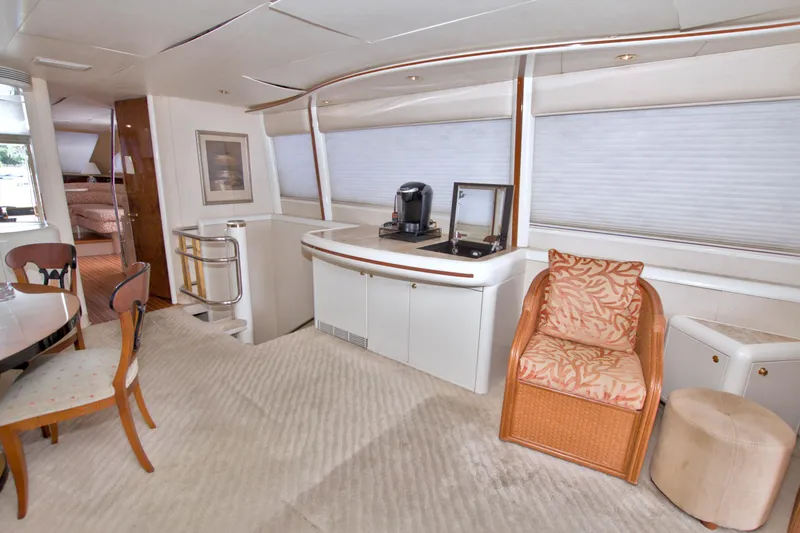 Slide: The Image of Luxurious interior of 1998 Lazzara 76 Skylounge Grand Salon yacht with elegant seating and decor. - 13