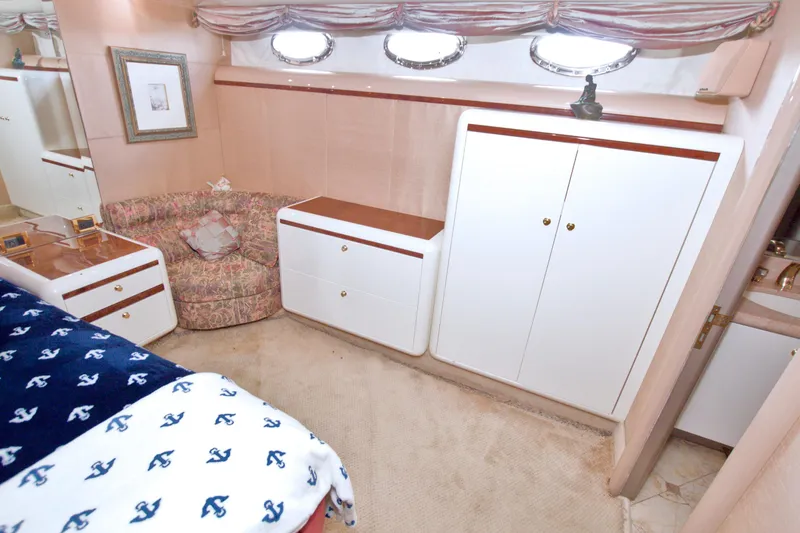 Slide: The Image of Luxurious cabin interior of 1998 Lazzara 76 Skylounge Grand Salon yacht. - 19