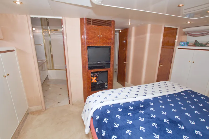 Slide: The Image of Luxurious bedroom interior of 1998 Lazzara 76 Skylounge Grand Salon yacht. - 20