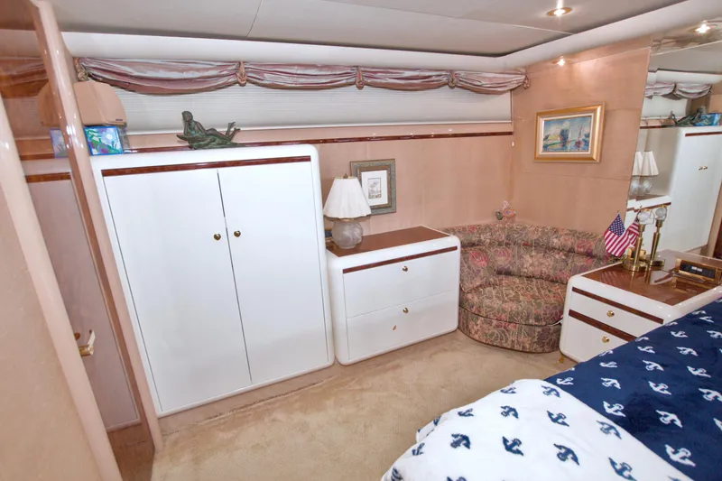 Slide: The Image of Luxurious interior of 1998 Lazzara 76 Skylounge Grand Salon yacht bedroom with elegant furnishings. - 28