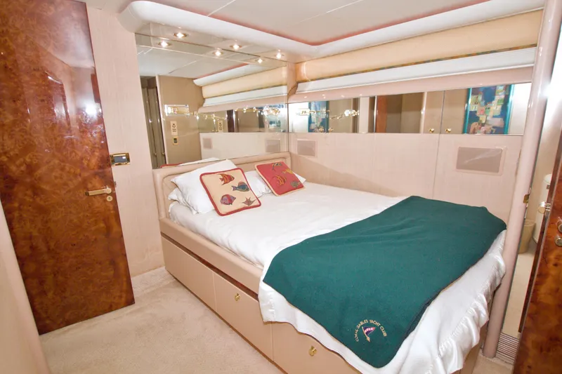Slide: The Image of Luxurious bedroom interior of 1998 Lazzara 76 Skylounge Grand Salon yacht. - 33