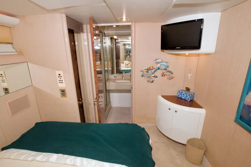 Slide: The Image of Luxurious bedroom interior of 1998 Lazzara 76 Skylounge Grand Salon yacht. - 35