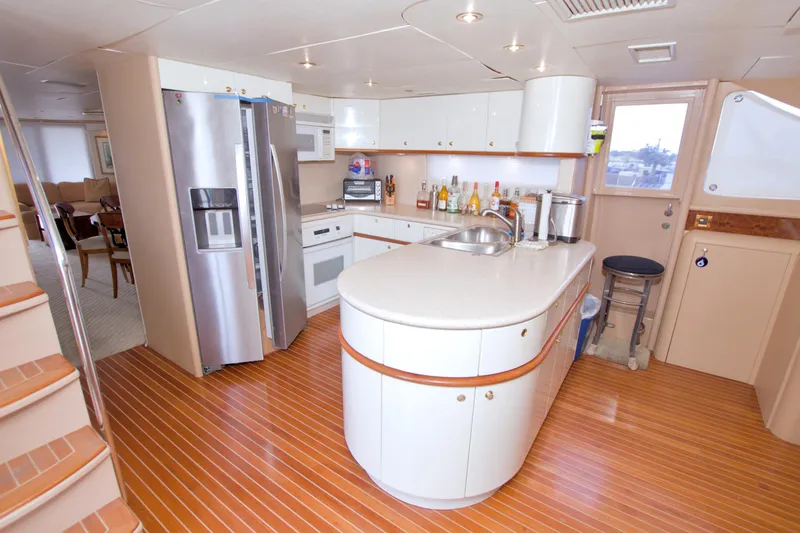 Slide: The Image of Luxurious kitchen interior of 1998 Lazzara 76 Skylounge Grand Salon yacht. - 47