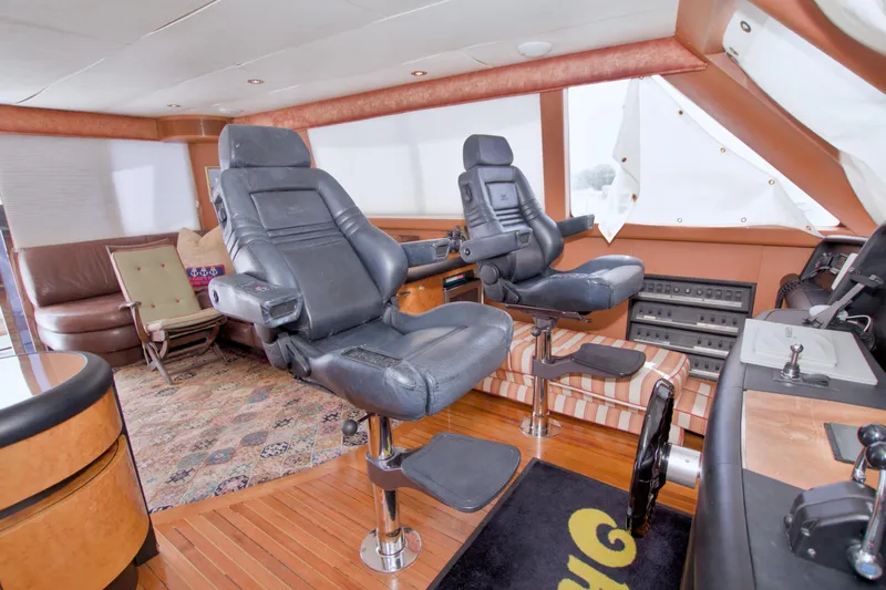Slide: The Image of Luxurious interior of 1998 Lazzara 76 Skylounge Grand Salon yacht with leather seating. - 54