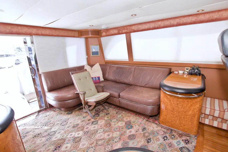 Slide: The Image of Luxurious interior of 1998 Lazzara 76 Skylounge Grand Salon yacht with leather seating and elegant decor. - 59