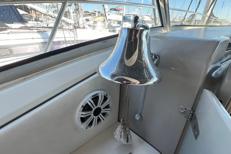Slide: The Image of Chrome bell and speaker on 2005 Sea Ray 390 Sundancer yacht interior. - 14
