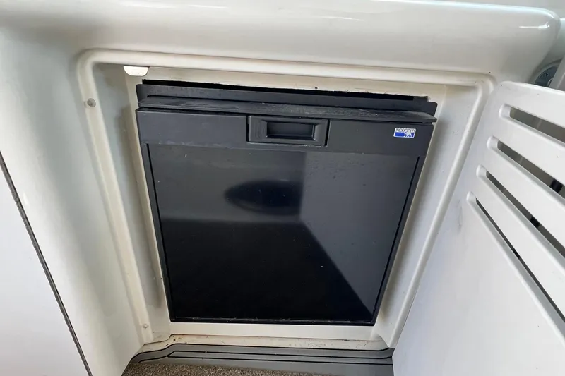 Slide: The Image of Built-in refrigerator on a 2005 Sea Ray 390 Sundancer yacht. - 19